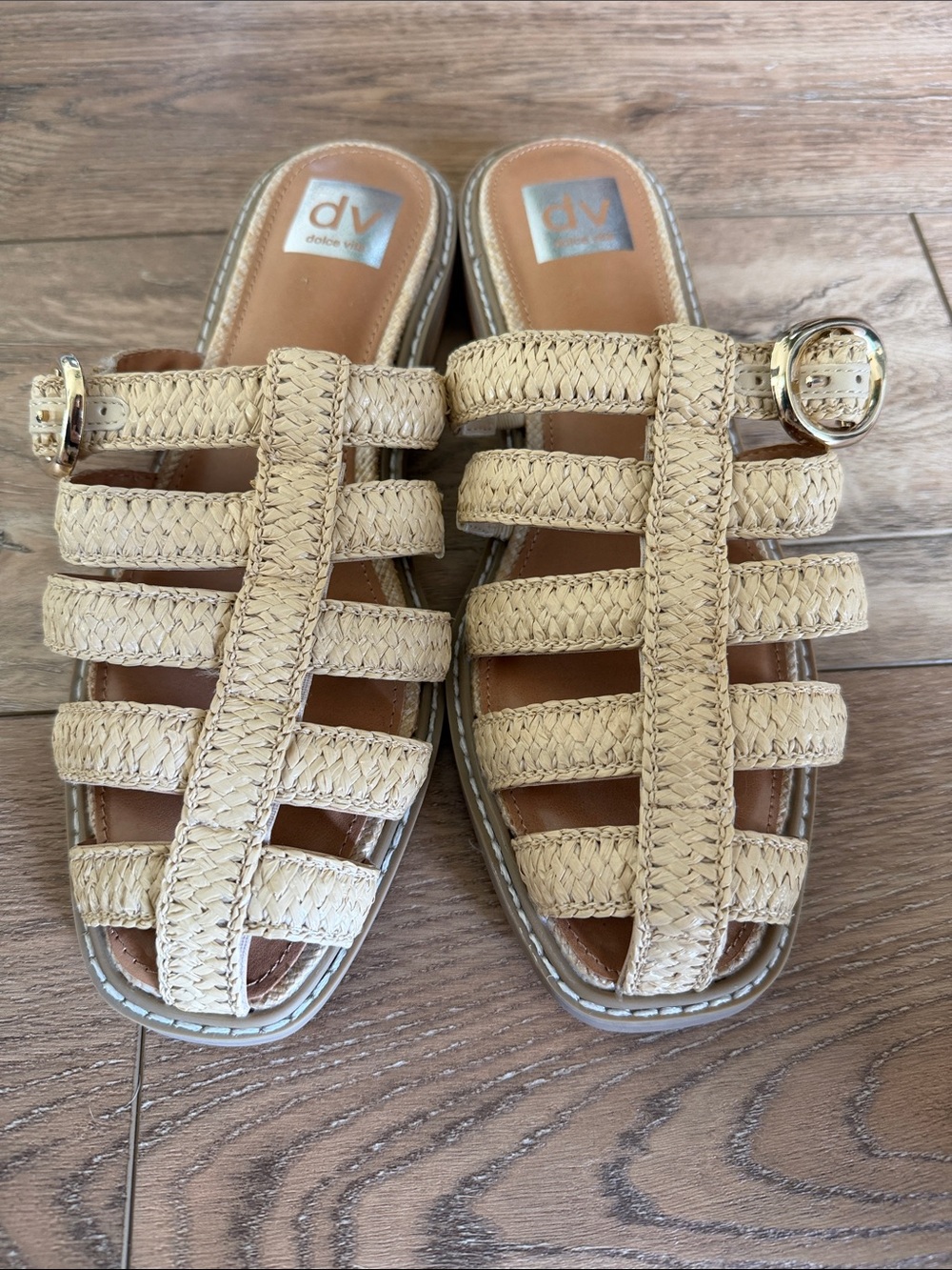 DV by Dolce Vita Tan Rattan Fisherman Slide. Gold buckle.